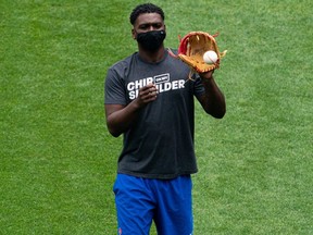 Philadelphia Phillies shortstop Didi Gregorius wears a mask during workouts at Citizens Bank Park.
