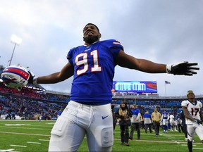 Buffalo Bills defensive tackle Ed Oliver (91) celebrates while leaving the field following a game against the Denver Broncos at New Era Field.