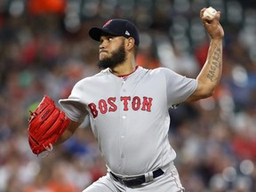 Red Sox pitcher Eduardo Rodriguez works the fourth inning against the Orioles at Oriole Park at Camden Yards in Baltimore, June 14, 2019.