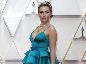 Florence Pugh poses on the red carpet during arrival at the 92nd Academy Awards in Hollywood February 9, 2020.