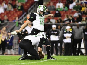 Justin Rohrwasser of the Marshall Thundering Herd kicks an extra point during the first quarter against the South Florida Bulls in the Gasparilla Bowl at Raymond James Stadium on December 20, 2018 in Tampa, Florida.