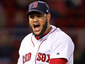 Eduardo Rodriguez of the Boston Red Sox celebrates after pitching the seventh inning against the Minnesota Twins  at Fenway Park on Sept. 4, 2019 in Boston.