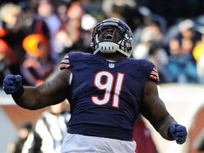 Eddie Goldman of the Chicago Bears celebrates after sacking quarterback  Brock Osweiler of the Denver Broncos in the first quarter at Soldier Field on November 22, 2015 in Chicago, Illinois.