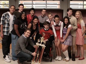 The Glee cast. Pictured back row L-R: Dijon Talton, Cory Monteith, Harry Shum Jr, Mark Salling, and Heather Morris. Front row L-R: Amber Riley, Matthew Morrison (kneeling), Jenna Ushkowitz, Kevin McHale, Naya Rivera, Lea Michele, Chris Colfer and Dianna Agron.