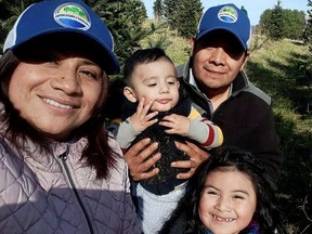 Serafin Saragoza, who is currently in detention at the Immigration and Customs Enforcement (ICE) facility in Farmville, Virginia and tested positive for the coronavirus disease (COVID-19), poses with his wife Norma Mondragon and two children in Blacksburg, Virginia, U.S. in November 2019.