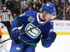 Vancouver Canucks' Elias Pettersson celebrates his shootout goal against Philadelphia Flyers goalie Carter Hart during NHL hockey shootout action in Vancouver on Saturday, Oct. 12, 2019.