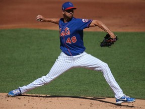 New York Mets starting pitcher Jacob deGrom pitches in a simulated game during summer camp workouts at Citi Field.