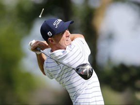 Justin Thomas plays his shot from the 15th tee during the third round of the Workday Charity Open golf tournament at Muirfield Village Golf Club, in Dublin, Ohio, July 11, 2020.