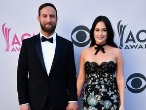 Singer Kacey Musgraves and her husband Ruston Kelly have filed for divorce after two years of marriage.