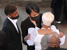 Atlanta Mayor Keisha Lance Bottoms consoles Tomika Miller, widow of Rayshard Brooks who was shot dead June 12 by an Atlanta police officer, during his funeral at Ebenezer Baptist Church in Atlanta, June 23, 2020.