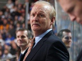 Lindy Ruff of the Buffalo Sabres watches their game against the Florida Panthers on February 3, 2013 at the First Niagara Center in Buffalo.