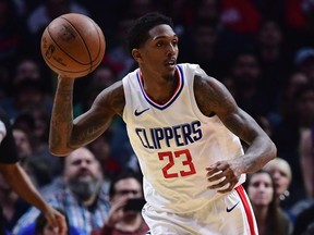 Clippers guard Lou Williams dribbles the ball during a game against the Timberwolves at Staples Center in Los Angeles, Jan. 22, 2018.