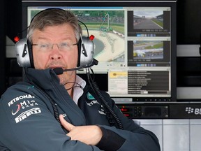 Mercedes Formula One team principal Ross Brawn looks on during the first practice session of the German F1 Grand Prix at the Nuerburgring racing circuit, July 5, 2013.