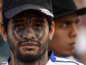 Members of MS-13 are held on Monday, March 4, 2013, in San Miguel.