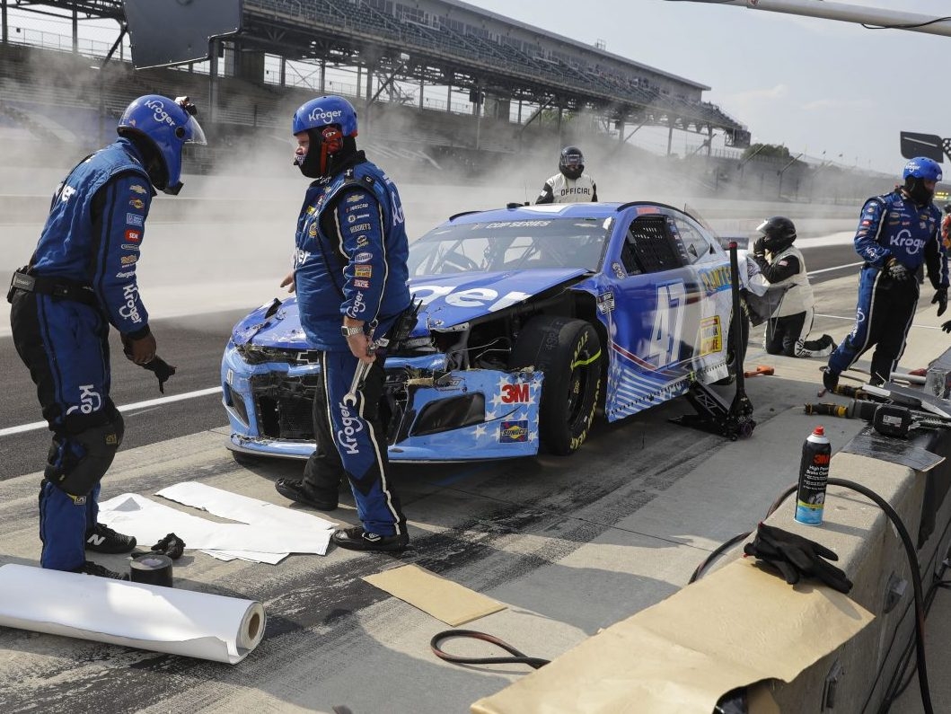 Crazy pit road wreck injures tire changer during Indy NASCAR race