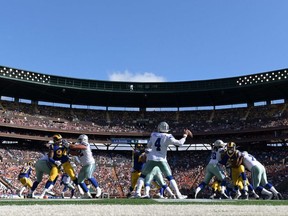 Dallas Cowboys quarterback Dak Prescott (4) throws the ball against the Los Angeles Rams at Aloha Stadium.
