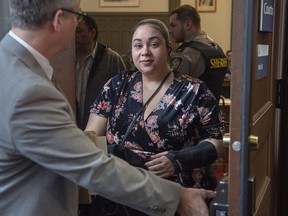 Santina Rao heads from provincial court in Halifax on Wednesday, February 19, 2020.