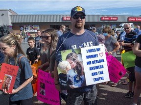 Nick Beaton, whose wife Kristen Beaton was killed in the April mass shooting, attends a march organized by families of victims demanding an inquiry into the crimes in Nova Scotia that killed 22 people, in Bible Hill, N.S. on Wednesday, July 22, 2020.