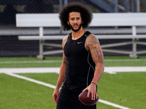 Colin Kaepernick is seen at a special training event created by Kaepernick to provide greater access to scouts, the media, and the public, at Charles. R. Drew High School in Riverdale, Georgia, Nov. 16, 2019.