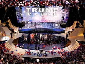 Donald Trump and his family are joined by vice presidential nominee Mike Pence and his family on stage at the Republican National Convention in Cleveland, Ohio, July 21, 2016.