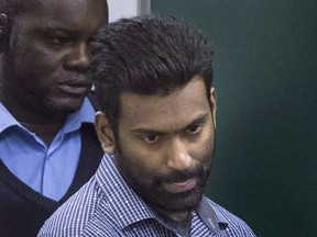 Sivaloganathan Thanabalasingham arrives for a detention review at the Immigration and Refugee Board of Canada in Montreal, Thursday, April 13, 2017.