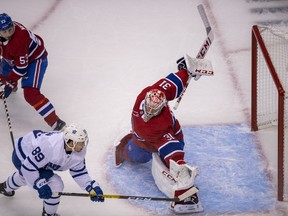 Maple Leafs rookie winger Nicholas Robertson just misses with a backhand against Montreal Canadiens goaltender Carey Price during exhibition play on Tuesday night at Scotiabank Arena.