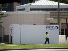 A refrigerated trailer sits outside of HCA Houston Healthcare Northwest on Friday, July 17, 2020.