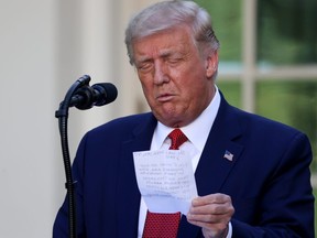 U.S. President Donald Trump attends a news conference in the Rose Garden at the White House in Washington, July 14, 2020.