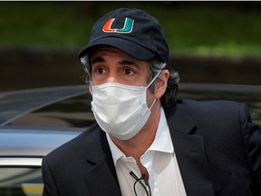 FILE PHOTO: Michael Cohen, the former lawyer for U.S. President Donald Trump, arrives back at home after being released from prison during the outbreak of the coronavirus disease (COVID-19) in New York City, New York, U.S., May 21, 2020. REUTERS/Brendan McDermid/File Photo ORG XMIT: FW1