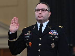 In this file photo taken on November 19, 2019, Lieutenant Colonel Alexander Vindman is sworn in during a House Intelligence Committee hearing on Capitol Hill in Washington.