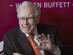 Warren Buffett speaks during a game of bridge following the annual Berkshire Hathaway shareholders meeting in Omaha, Neb., Sunday, May 5, 2019.