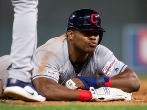 Cleveland Indians outfielder Yasiel Puig blows a kiss to the dugout against Minnesota Twins at Target Field.
