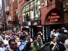 Fans of Paul McCartney make their way inside The Cavern Club, as the singer plays a one off gig at the legendary venue on July 26, 2018 in Liverpool, England.