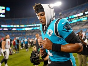 CHARLOTTE, NORTH CAROLINA - SEPTEMBER 12: Cam Newton #1 of the Carolina Panthers runs off the field after their game against the Tampa Bay Buccaneers at Bank of America Stadium on September 12, 2019 in Charlotte, North Carolina.