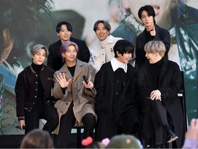 (L-R) Jimin, Jungkook, RM, J-Hope, V, Jin, and SUGA of the K-pop boy band BTS visit the "Today" Show at Rockefeller Plaza on February 21, 2020 in New York City.