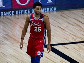 Ben Simmons of the Philadelphia 76ers walks up the court during the first half of an NBA basketball game against the Washington Wizards at The Arena at ESPN Wide World Of Sports Complex on August 5, 2020 in Lake Buena Vista, Florida.