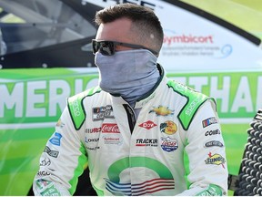 Austin Dillon, driver of the American Ethanol Chevrolet, waits on the grid prior to the NASCAR Cup Series Super Start Batteries 400 Presented by O'Reilly Auto Parts at Kansas Speedway on July 23, 2020 in Kansas City, Kansas.