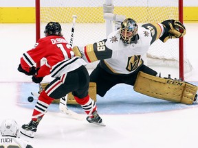Marc-Andre Fleury of the Vegas Golden Knights makes the second period save on Alex DeBrincat of the Chicago Blackhawks in Game 3  of the Western Conference First Round during the 2020 NHL Stanley Cup Playoffs at Rogers Place on Aug. 15, 2020 in Edmonton.