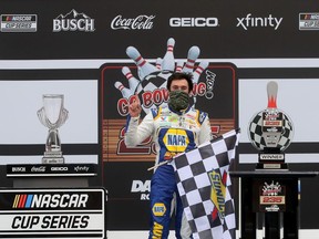 Chase Elliott, driver of the #9 NAPA Auto Parts Chevrolet, celebrates in Victory Lane after winning the NASCAR Cup Series Go Bowling 235 at Daytona International Speedway on August 16, 2020 in Daytona Beach, Florida.