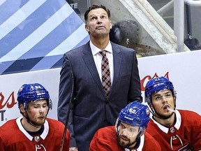 Canadiens interim head coach Kirk Muller peeks at the scoreboard during Game 4 of the Eastern Conference quarter-finals Tuesday against Philadelphia. Montreal "is a special family, it’s a special franchise," he says.