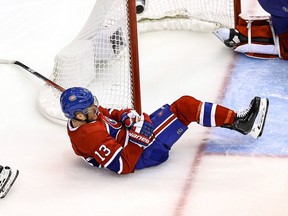Montreal Canadiens forward Max Domi winces after crashing into goalpost during Game 6 of playoff series against the Philadelphia Flyers Friday night at Toronto’s Scotiabank Arena.