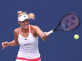 Angelique Kerber of Germany returns a shot during her Women's Singles first round match against Ajla Tomljanovic of Australia on Day One of the 2020 US Open at the USTA Billie Jean King National Tennis Center on August 31, 2020 in the Queens borough of New York City.