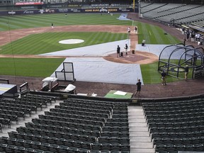 The Milwaukee Brewers took batting practice after their game against the St. Louis Cardinals was cancelled due to the pandemic at Miller Park, July 31, 2020.
