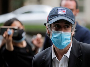 Michael Cohen, former personal lawyer for U.S. President Donald Trump, arrives at his Manhattan apartment after being released from federal prison to serve the remainder of his sentence under home confinement in New York City, July 24, 2020.