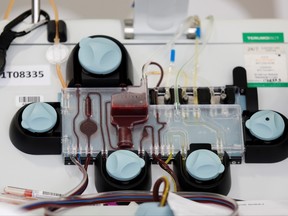 An apheresis machine separates and collects convalescent plasma from the whole blood of a recovered coronavirus patient at the Central Seattle Donor Center of Bloodworks Northwest during the outbreak in Seattle, Washington, April 17, 2020.