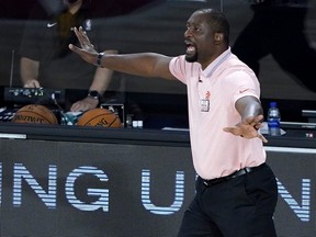 Assistant coach Adrian Griffin of the Toronto Raptors reacts during first-half action against the Philadelphia 76ers at The Field House at ESPN Wide World Of Sports Complex on August 12, 2020 in Lake Buena Vista, Florida.