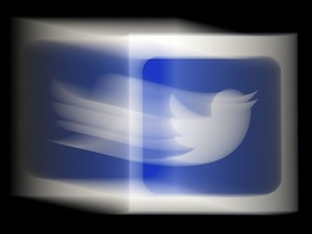 In this photo illustration, a Twitter logo is displayed on a mobile phone on August 10, 2020, in Arlington, Virginia.