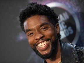 In this file photo US actor Chadwick Boseman poses in the press room during the 2019 American Music Awards at the Microsoft theatre on November 24, 2019 in Los Angeles.