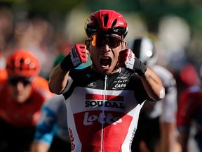 Team Lotto rider Australia's Caleb Ewan celebrates as he crosses the finish line and wins the 3rd stage of the 107th edition of the Tour de France cycling race, 198 km between Nice and Sisteron, on August 31, 2020.