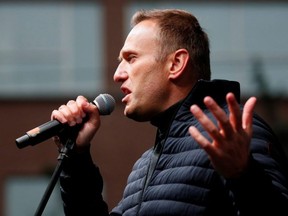 Russian opposition leader Alexei Navalny delivers a speech during a rally to demand the release of jailed protesters, who were detained during opposition demonstrations for fair elections, in Moscow, Sept. 29, 2019.
